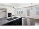 Kitchen features an island with granite countertops, stainless steel appliances and a gas fireplace at 813 Whittington Sw Pkwy, Marietta, GA 30060