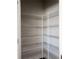 Walk-in pantry offers ample storage space with multiple wire shelves and a light at 813 Whittington Sw Pkwy, Marietta, GA 30060