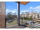 Enjoy neighborhood views from this private balcony with wood flooring and sleek railing at 145 Hutchinson Ne St, Atlanta, GA 30307