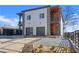 Modern two-story home with stylish gray siding, wood accents, and a well-manicured front yard at 145 Hutchinson Ne St, Atlanta, GA 30307