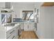 Modern kitchen featuring a center island and stainless steel appliances, and undermount sink at 145 Hutchinson Ne St, Atlanta, GA 30307