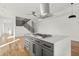 Modern kitchen featuring a center island, and stainless steel appliances at 145 Hutchinson Ne St, Atlanta, GA 30307