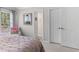 Bedroom featuring neutral paint, carpet, and art hung on the walls at 155 Saddleview Run, Atlanta, GA 30350