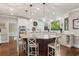 Spacious eat-in kitchen features a granite island, white cabinets, and stainless steel appliances at 155 Saddleview Run, Atlanta, GA 30350