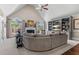 Bright living room with vaulted ceilings, large windows, and a cozy fireplace at 155 Saddleview Run, Atlanta, GA 30350