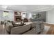 Cozy living room with fireplace, recessed lighting, and modern entertainment center at 155 Saddleview Run, Atlanta, GA 30350