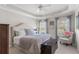 Bright main bedroom with tray ceiling, neutral colors, and large windows at 155 Saddleview Run, Atlanta, GA 30350