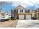 Charming two-story home featuring a two car garage and beautiful stone and siding facade at 5232 Centennial Hill Nw Dr, Acworth, GA 30102