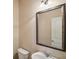 Charming powder room with a decorative mirror and vanity at 5232 Centennial Hill Nw Dr, Acworth, GA 30102