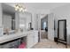 Bright bathroom with a vanity, sink, and a doorway leading to another room at 2860 River Close Dr, Decatur, GA 30034