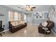 Open-concept living room with laminate floors, neutral walls, and modern decor at 2860 River Close Dr, Decatur, GA 30034