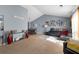 Spacious living room featuring a vaulted ceiling, lots of sunlight, and dining area at 2860 River Close Dr, Decatur, GA 30034