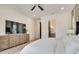 Bright and airy bedroom featuring hardwood floors, a tv, and neutral decor at 2497 Sugar Pike Rd, Canton, GA 30115