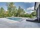 Resort-style pool with lounge chairs and lush landscaping, perfect for relaxation and entertainment at 2497 Sugar Pike Rd, Canton, GA 30115