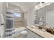 Beautiful bathroom featuring tile floors, a shower/tub combo, and modern fixtures at 336 Little Pine Ln, Woodstock, GA 30188