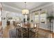 Bright dining room with hardwood floors and natural light at 336 Little Pine Ln, Woodstock, GA 30188