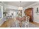 Inviting dining room featuring hardwood floors and an open concept design at 336 Little Pine Ln, Woodstock, GA 30188