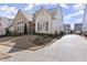 Charming home featuring a blend of stone and siding accents with beautiful landscaping at 336 Little Pine Ln, Woodstock, GA 30188