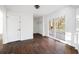 Open living room with sliding glass doors leading to the deck and dark wood floors at 3451 Keswick Ct, Atlanta, GA 30341