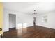 Bright living room features gleaming hardwood floors, fresh white walls, and natural light at 3451 Keswick Ct, Atlanta, GA 30341