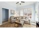 Cozy living room features neutral furniture, tile floors, and lots of natural light at 3999 Treemont Ln, Suwanee, GA 30024