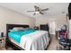 Comfortable bedroom featuring a ceiling fan, closet space, and a cozy atmosphere at 9556 River Ct, Jonesboro, GA 30238