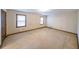Spacious bedroom with two windows for plenty of natural light at 5065 Hubert Dr, Powder Springs, GA 30127