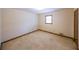 Bedroom featuring neutral carpet, a single window, and a closet for storage at 5065 Hubert Dr, Powder Springs, GA 30127