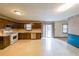 Spacious kitchen with wood cabinets, white countertops and modern appliances at 5065 Hubert Dr, Powder Springs, GA 30127