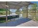 Dock featuring a covered boat slip and kayak launch, perfect for enjoying lake activities at 7360 Fields Dr, Cumming, GA 30041