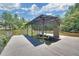 Dock featuring a covered boat slip and kayak launch, perfect for enjoying lake activities at 7360 Fields Dr, Cumming, GA 30041