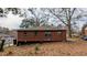 Rear view of a brick home with a yard at 2914 Wanda Sw Cir, Atlanta, GA 30315