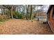 Spacious backyard with leafy trees, offering privacy at 2914 Wanda Sw Cir, Atlanta, GA 30315