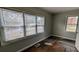 Bedroom with hardwood floors, neutral paint, and many windows at 2914 Wanda Sw Cir, Atlanta, GA 30315