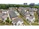 Neighborhood featuring luxury homes, community pool, manicured lawns, and mature trees at 6657 Encore Blvd, Atlanta, GA 30328