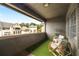 Relaxing outdoor balcony space with seating and views of the surrounding community and nearby buildings at 6657 Encore Blvd, Atlanta, GA 30328