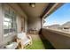 Cozy balcony featuring a seating area and providing neighborhood views, perfect for relaxing outdoors at 6657 Encore Blvd, Atlanta, GA 30328