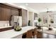 Bright and airy kitchen boasts a large island, sleek appliances, and a cozy seating area, perfect for both cooking and relaxing at 6657 Encore Blvd, Atlanta, GA 30328