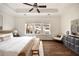 Main bedroom boasts a stylish aesthetic, large windows, hardwood floors, and modern comfort for relaxation at 6657 Encore Blvd, Atlanta, GA 30328