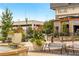 The Yalda restaurant boasts outdoor seating with an open patio and lush landscaping for a relaxing atmosphere at 6657 Encore Blvd, Atlanta, GA 30328