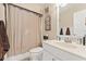 Cozy bathroom featuring a single sink vanity, toilet, and shower with neutral tones at 154 Hunters Trl, Dallas, GA 30157