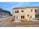 The backyard of this home features a brick facade, a small patio and wooden fence at 325 Heavenly Hollow Pl, Mcdonough, GA 30253