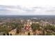 An aerial shot shows the house and the landscape surrounding it at 4087 Glenn Rd, Powder Springs, GA 30127