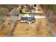 Birds eye view of house with in-ground pool and patio area surrounded by manicured lawns and neighboring properties at 4087 Glenn Rd, Powder Springs, GA 30127