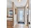 Bathroom with a glass door to the exterior, custom tile accents, and a sunken tub at 4087 Glenn Rd, Powder Springs, GA 30127