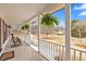 Inviting front porch with rocking chairs and hanging plants at 4087 Glenn Rd, Powder Springs, GA 30127