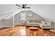 Upstairs living room with vaulted ceilings, hardwood floors, and neutral tones at 4087 Glenn Rd, Powder Springs, GA 30127