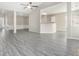 Open concept living space with wood-look floors and natural light at 503 Goldfinch Way, Stockbridge, GA 30281