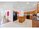 Spacious kitchen with stainless steel appliances and wooden cabinets at 6068 Magnolia Rdg, Stone Mountain, GA 30087