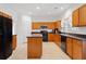 Bright kitchen featuring stainless steel appliances and ample cabinet space at 6068 Magnolia Rdg, Stone Mountain, GA 30087